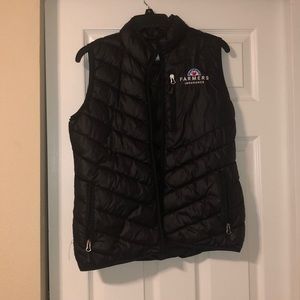Never worn Farmers Insurance vest.